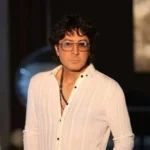 آهنگ توی باغچه ی عشق یه گل میخوام که رنگش فرشید امین